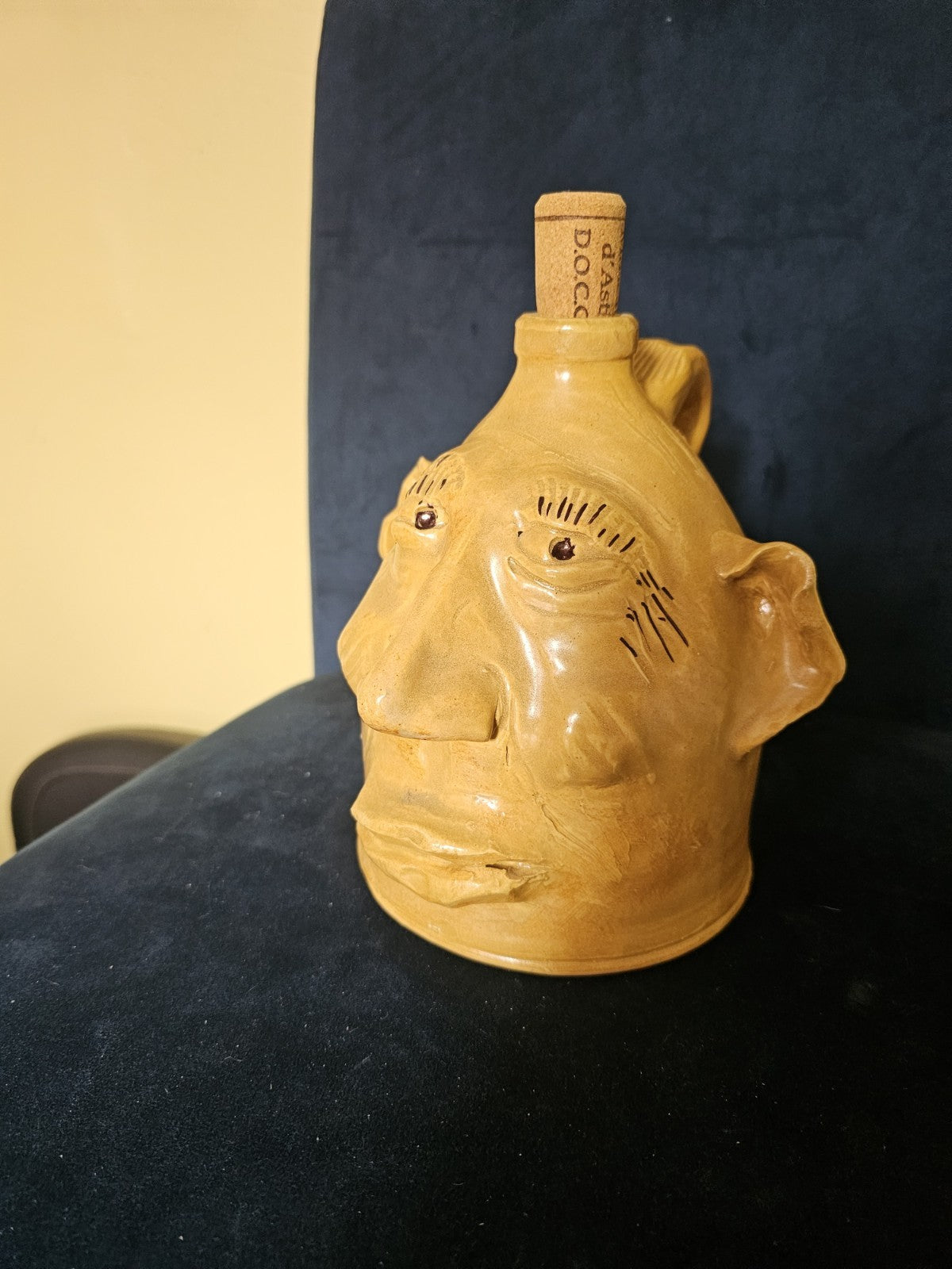 Vintage Art Moonshine jug or handmade clay sculpture a head with a cork